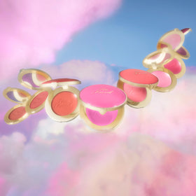 Too Faced blush on beach setting evoking tropical scent and sensory experience