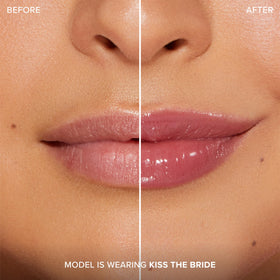 Too Faced product next to coin showing Lip Injection Clicks travel-friendly size