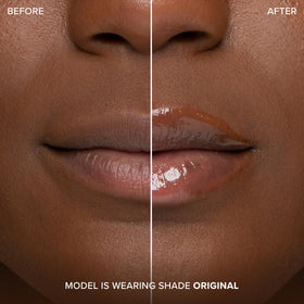 Too Faced tinted gloss applied to lips showcasing color payoff and added dimension