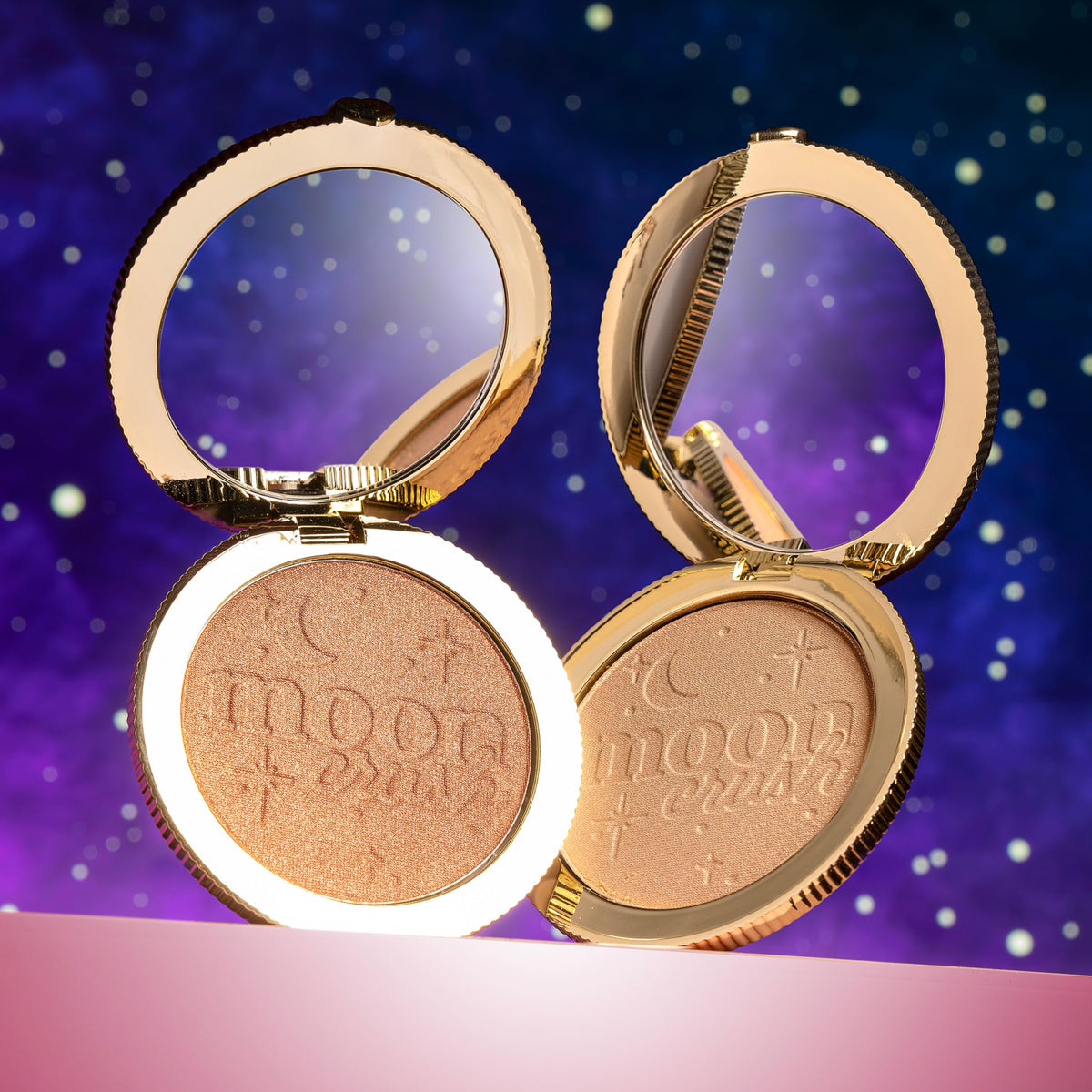 Too Faced held in hand showing compact size for travel convenience
