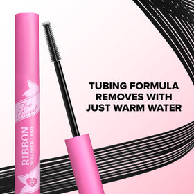 Too Faced open tube showing applicator neck and product consistency