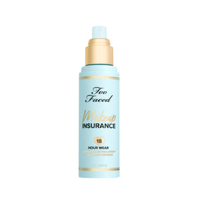Too Faced setting spray inside a makeup bag on vanity, suggests everyday convenience