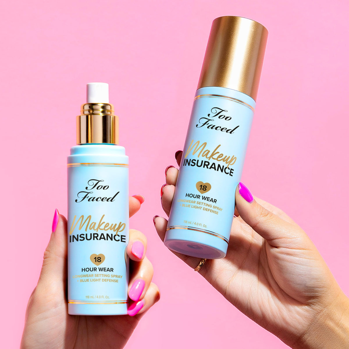 Too Faced 4 fl oz bottle beside common items for scale, clarifies travel-friendly size