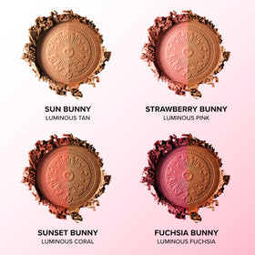 Too Faced brush swirling powder showing easy pickup and even application