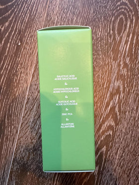 Topicals Clearly bottle on bathroom shelf in lifestyle setting for daily routine