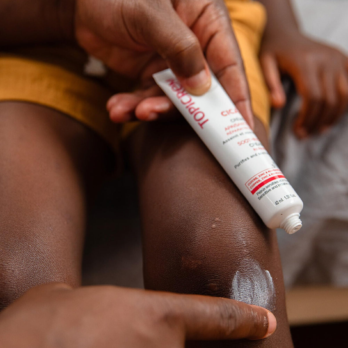 Topicrem CICA cream applied to hand illustrating quick absorption and comfort