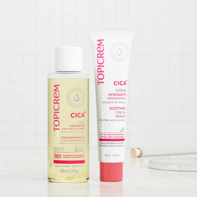 Topicrem CICA Repair Cream beside common items showing 100ml travel-friendly size