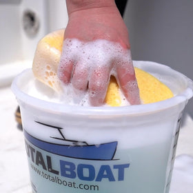 TotalBoat soap close-up pouring to show low-suds texture and easy rinsing