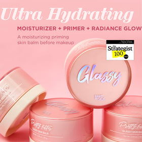TOUCH IN SOL open jar close-up revealing glassy balm texture for hydration appeal