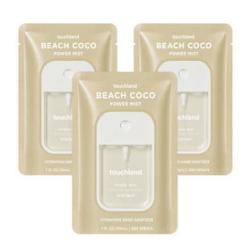Touchland Beach Coco trio front view showing three travel spray bottles and bright packaging benefit: portable hygiene