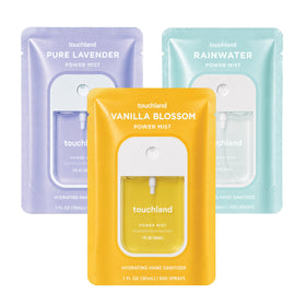 Touchland Blossom Trio front packaging showing three travel-size sprays and benefits