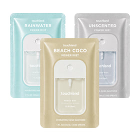 Touchland front packaging showing the three dye-free travel mists and benefits
