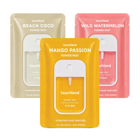 Touchland front packaging showing three tropical sanitizer sprays, convenient travel set