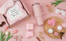 Tova's Creations tumbler with straw held in hand illustrating travel-friendly convenience