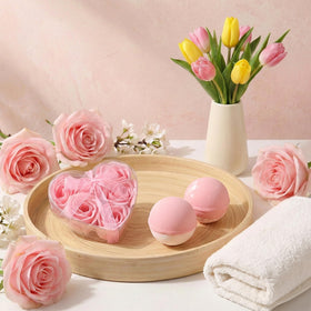 Tova's Creations bath bombs, floral soap and candle grouped to convey calming aromas
