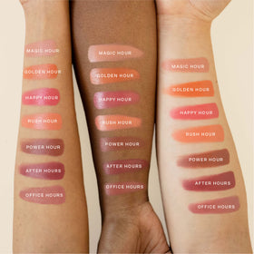 Tower 28 swipe of tint on lips showing juicy coral color and hydrating look