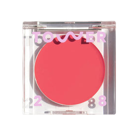 Tower 28 front packaging showing compact coral-pink shade and clear branding benefits