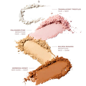 Tower 28 powder in a handbag lifestyle shot showing easy touch-ups and on-the-go wear benefit