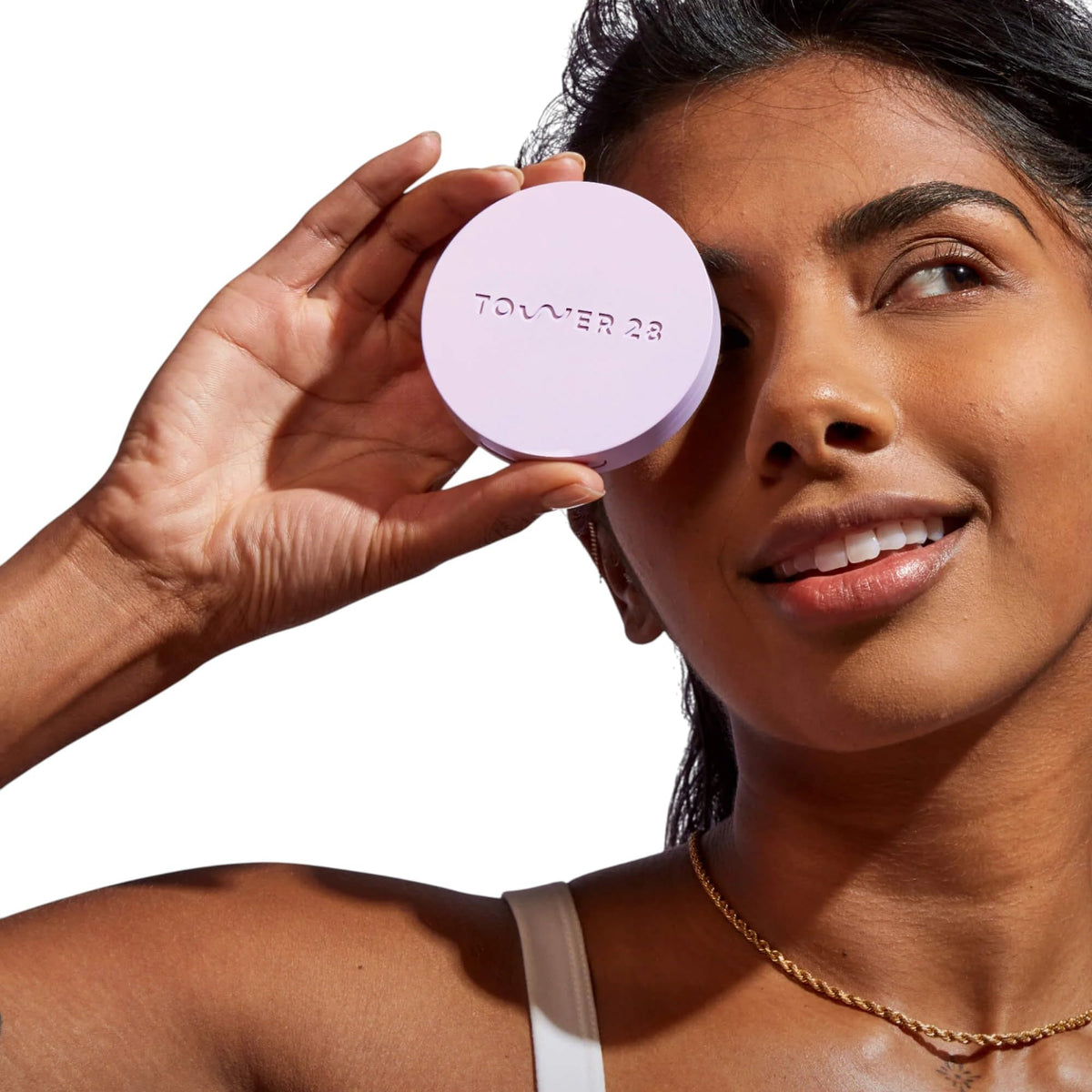 Tower 28 powder puff pressing product demonstrating easy application and longevity