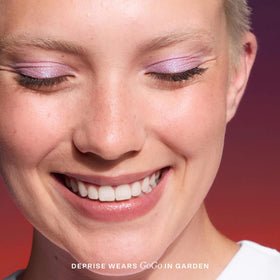 Tower 28 full eye look showing bold purple shimmer and long wear