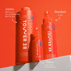 Tower 28 16 oz bottle beside common items to show large travel-friendly size