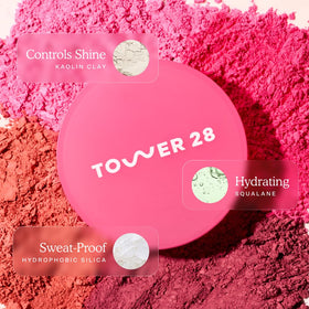 Tower 28 compact in hand illustrating size and travel-friendly benefit