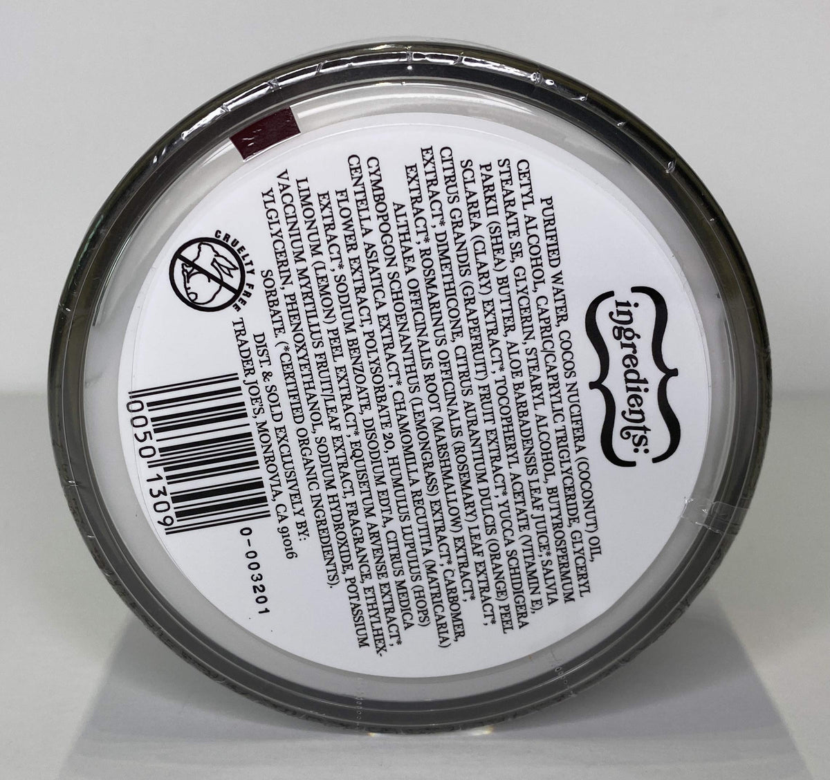 Trader Joe's applying body butter on arm demonstrating smooth absorption benefit