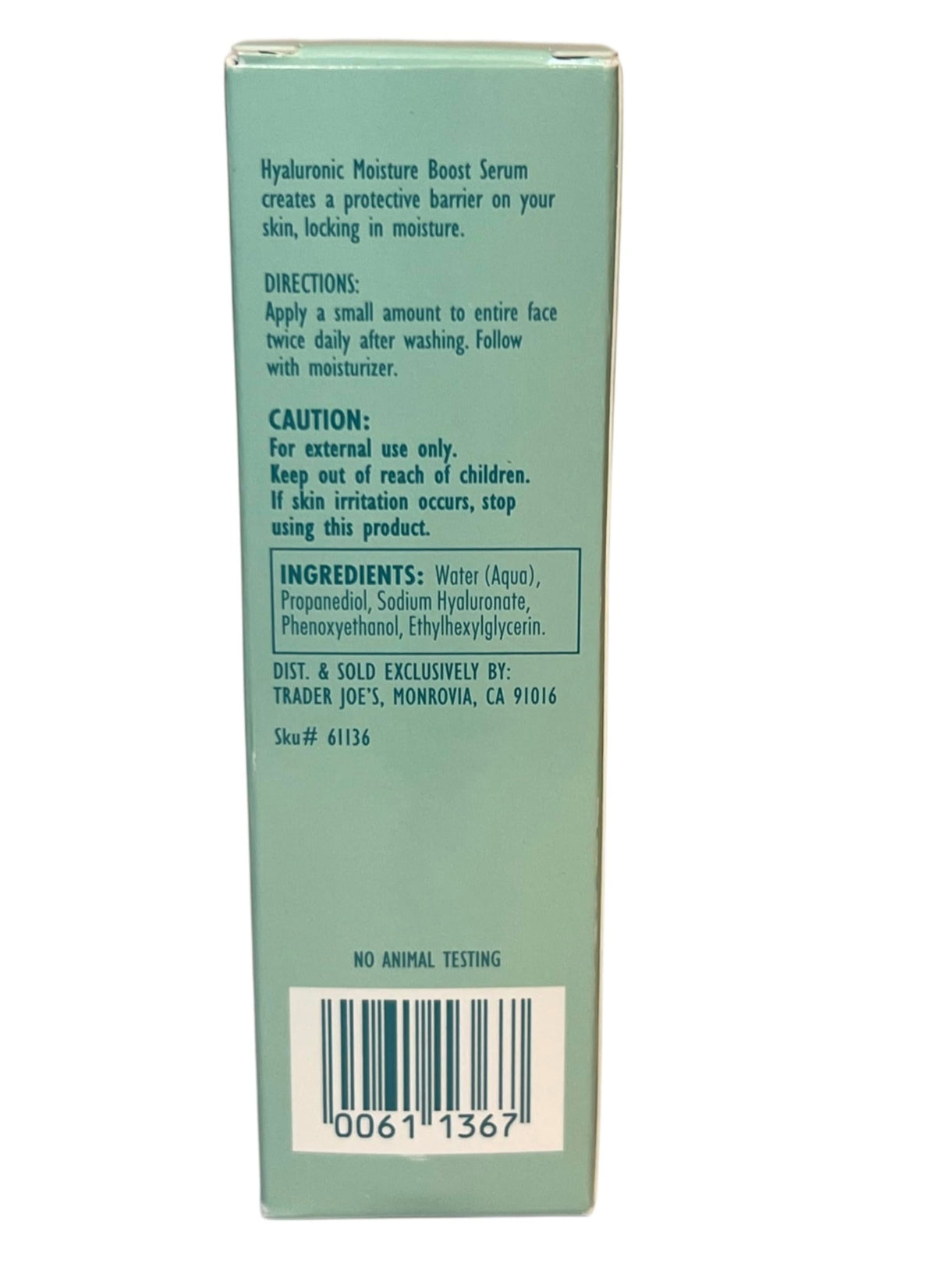 Trader Joe's dropper close-up dispensing clear serum highlighting precise application benefit