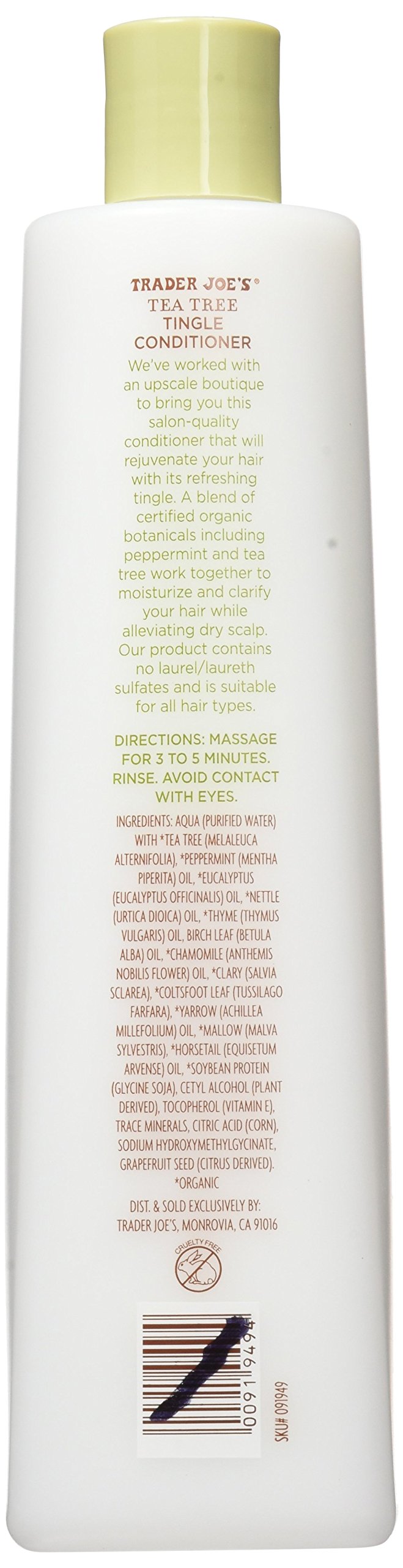 Trader Joe's conditioner in shower held by hand demonstrating refreshing use