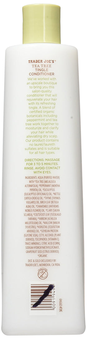 Trader Joe's conditioner in shower held by hand demonstrating refreshing use