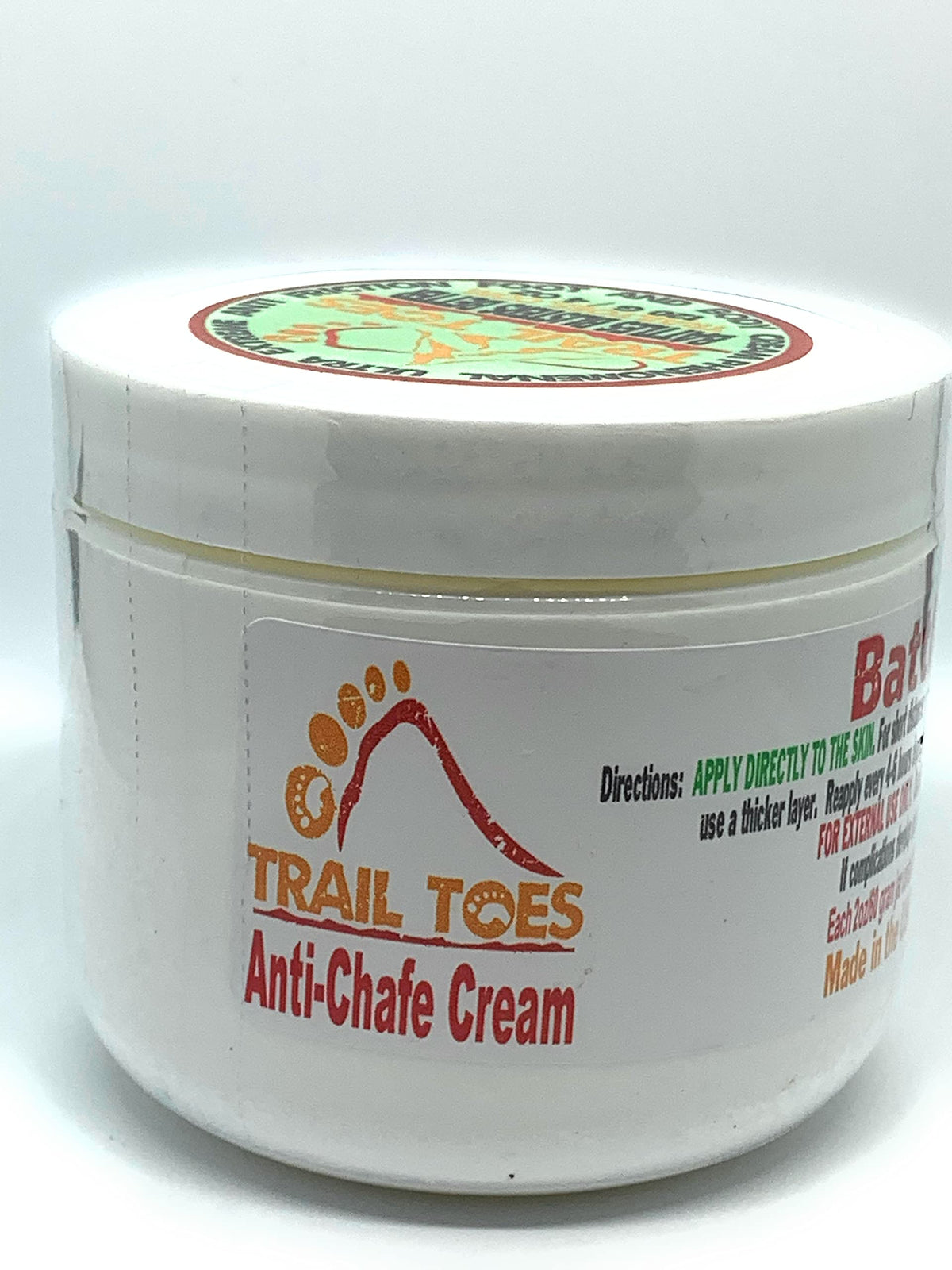 Trail Toes 4 oz jar in hand showing portable travel-friendly benefit
