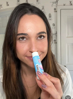 TREAT marshmallow stick in purse lifestyle shot for on-the-go hydration