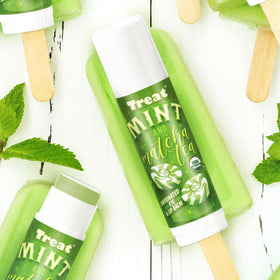 TREAT with fresh mint leaf highlighting mint scent and cooling lip refreshment