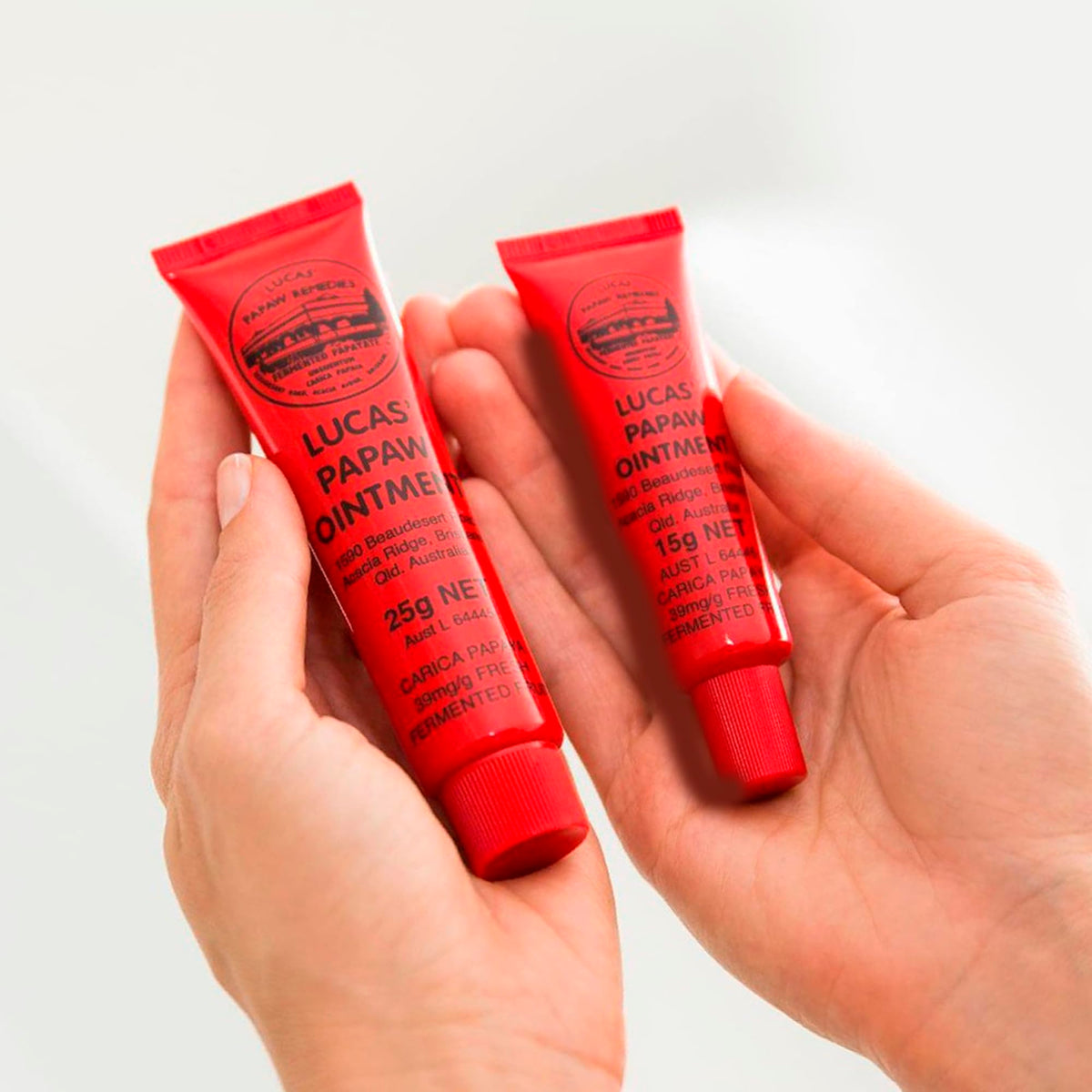 Treats from Home applying ointment to lips demonstrating quick relief