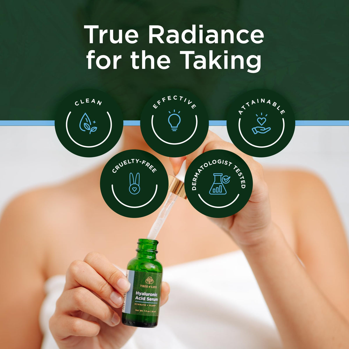 Tree of Life serum bottle on bathroom vanity staged with towels showing everyday skincare use