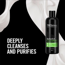 TRESemmé bottle on bathroom shelf next to towels, ready-to-use salon-style clean