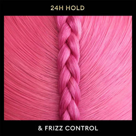 Model with styled hair after TRESemmé use showing smooth, frizz-controlled benefit