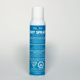 Tressallure spray being applied to a wig to add definition and volume