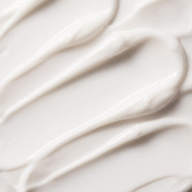 Trilogy applied on hand demonstrating absorption and non-greasy finish benefit