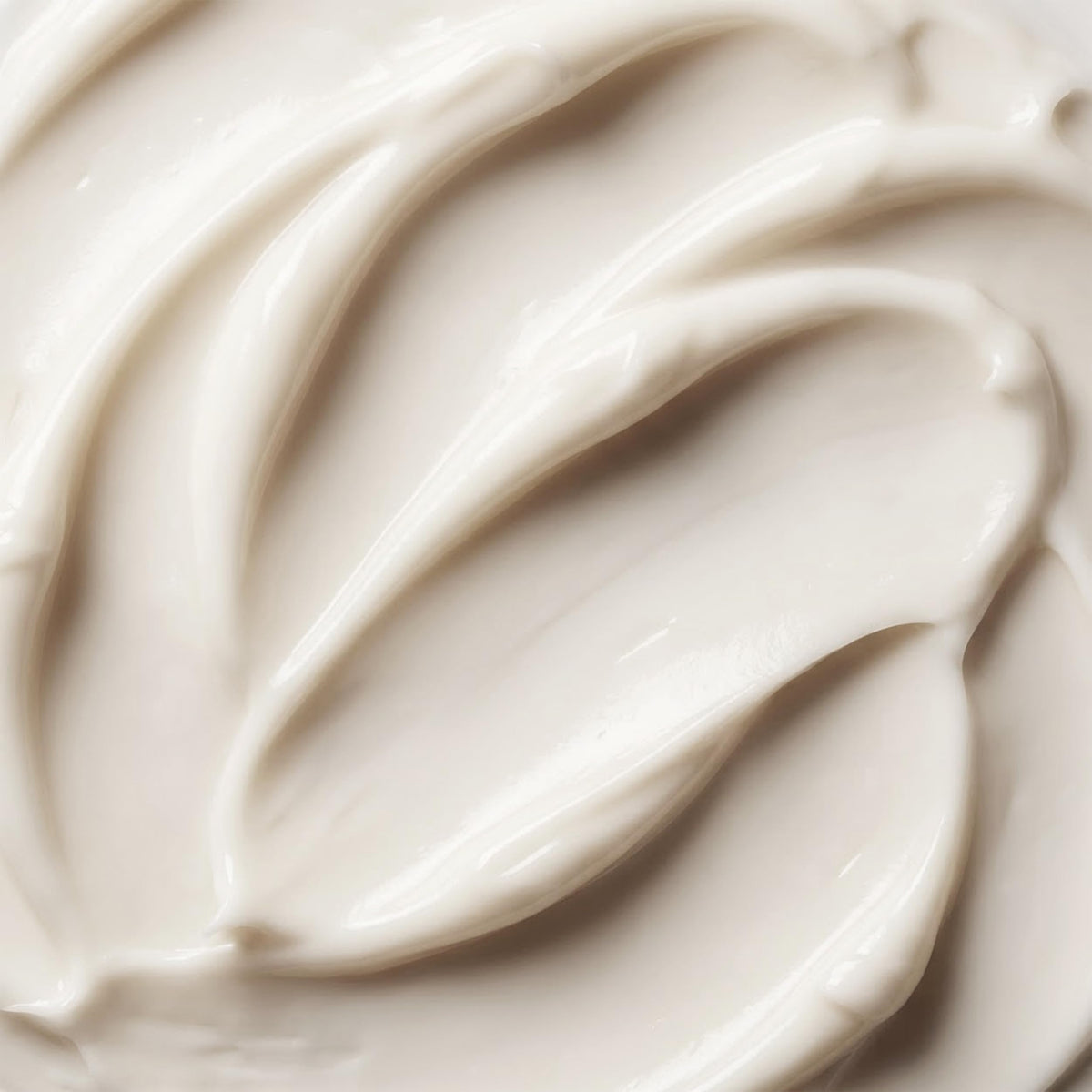 Trilogy cleanser dispensed into hand illustrating easy application and soft lather