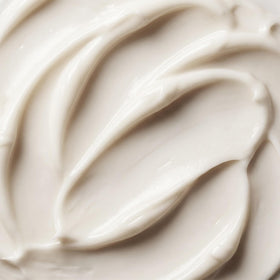Trilogy cleanser dispensed into hand illustrating easy application and soft lather