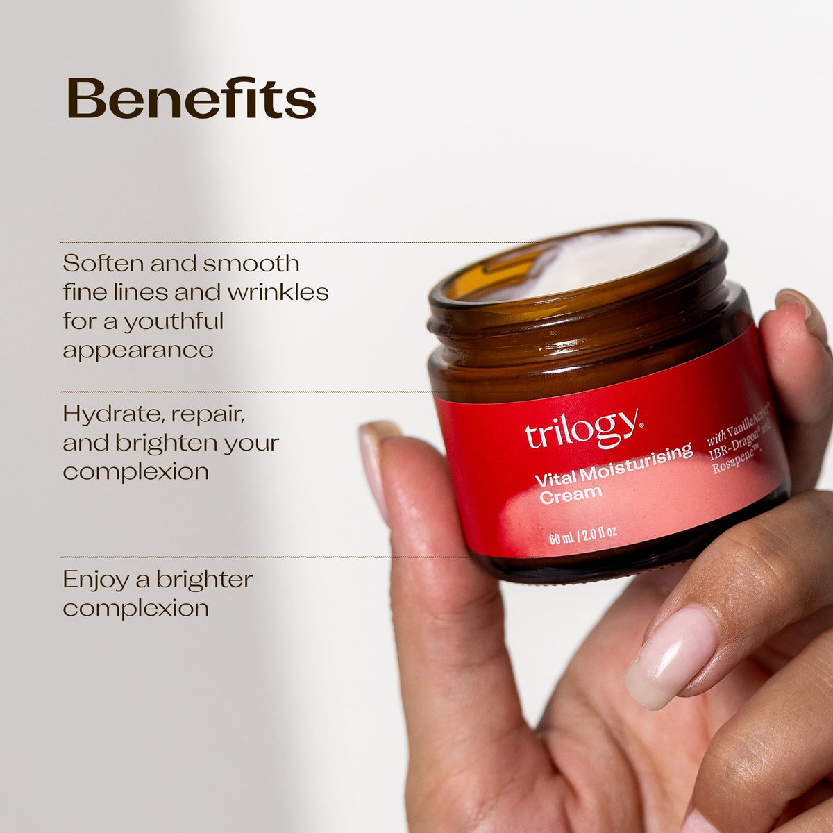 Trilogy cream being applied to fingers demonstrating easy spreadability and fast absorption