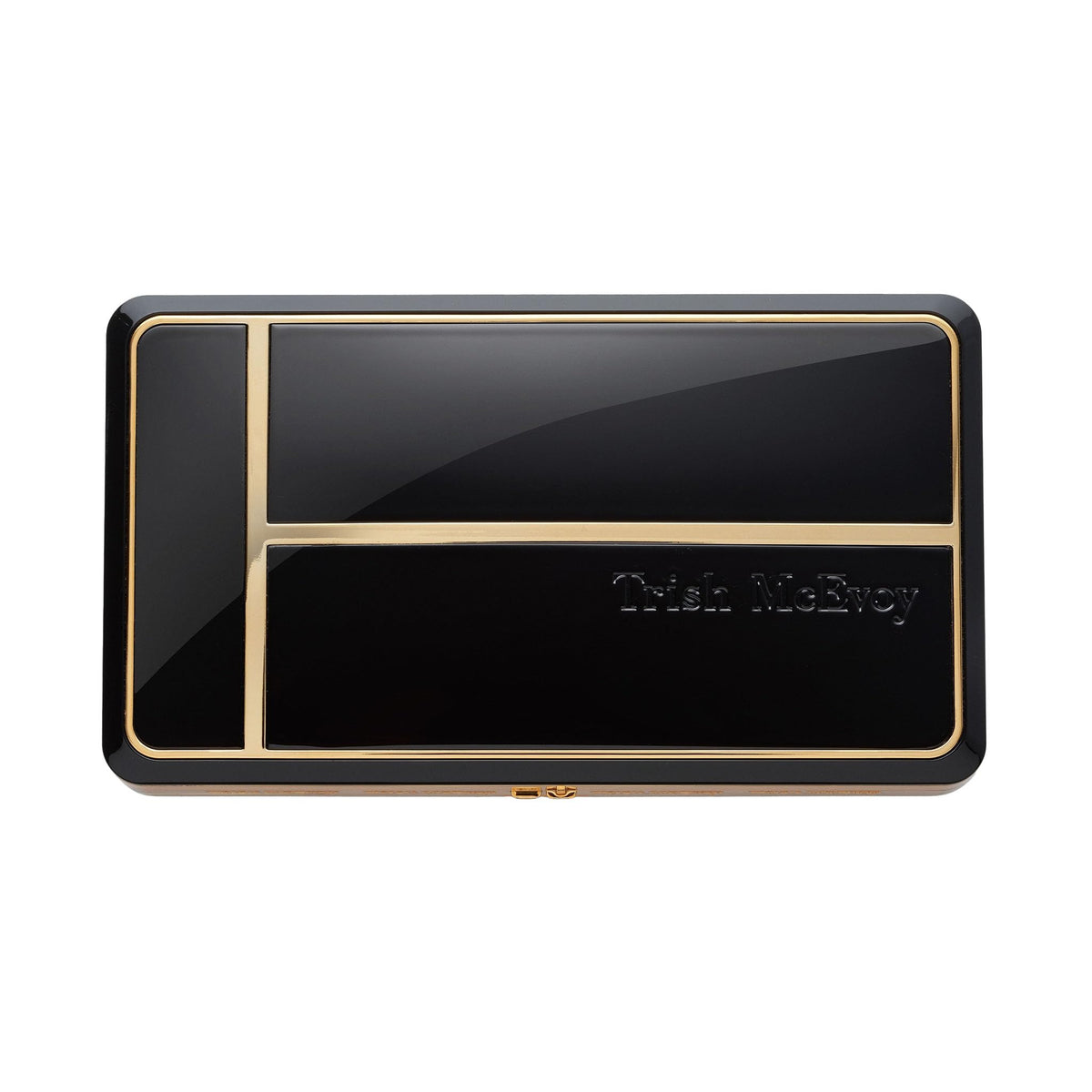 Trish McEvoy compact front packaging showing elegant case and brand logo for portability