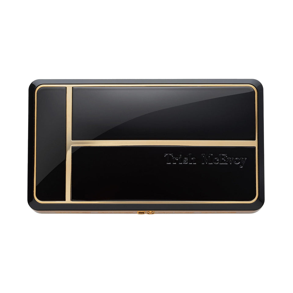 Trish McEvoy compact front packaging showing elegant case and brand logo for portability