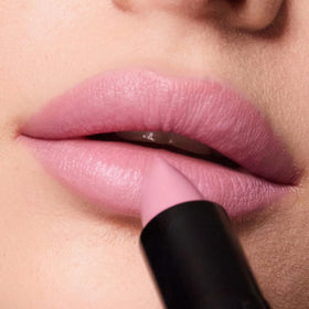 Trish McEvoy model applying Dolled Up for quick, effortless polish