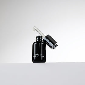 Trish McEvoy serum texture on fingertip highlighting lightweight hyaluronic hydration benefit