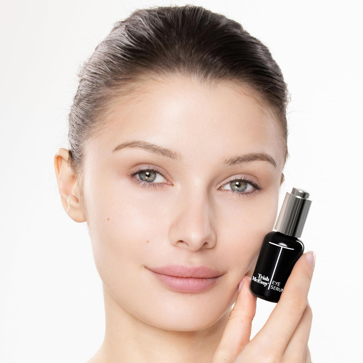 Trish McEvoy pipette dispensing clear serum drop for precise application and controlled dosing