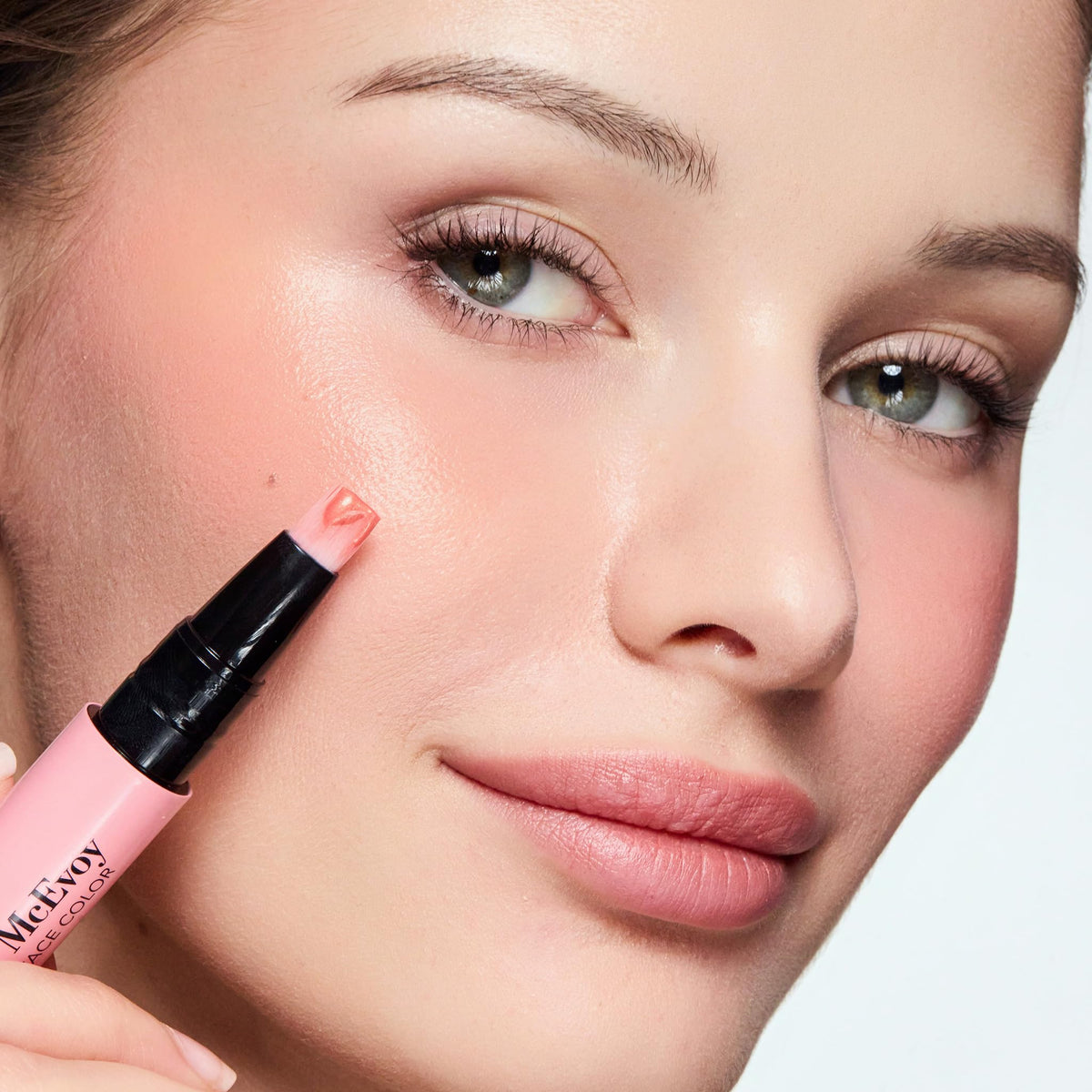 Trish McEvoy fingertip applying product showing easy blendability and control