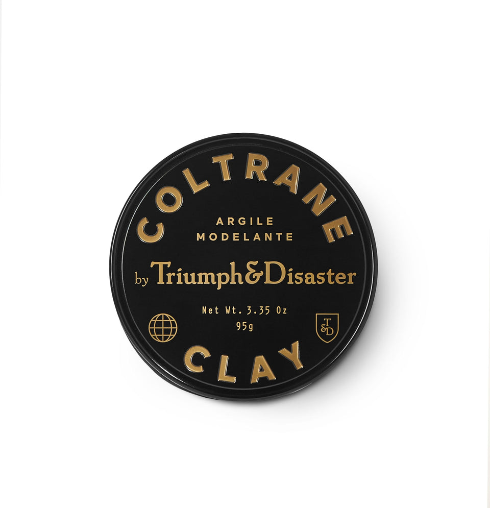 TRIUMPH & DISASTER tin front showing sleek packaging and premium finish benefit