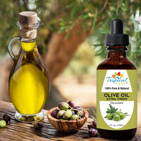 Tropical Holistic oil being poured highlighting purity and cold-pressed benefit